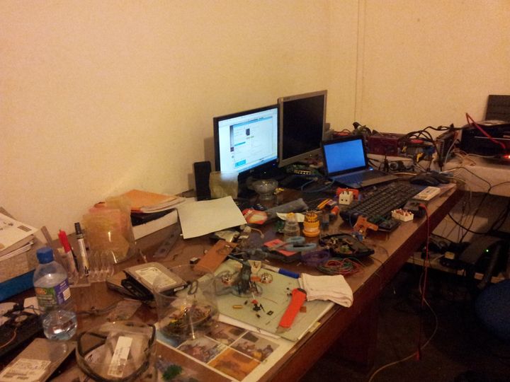 Desk covered in tech parts